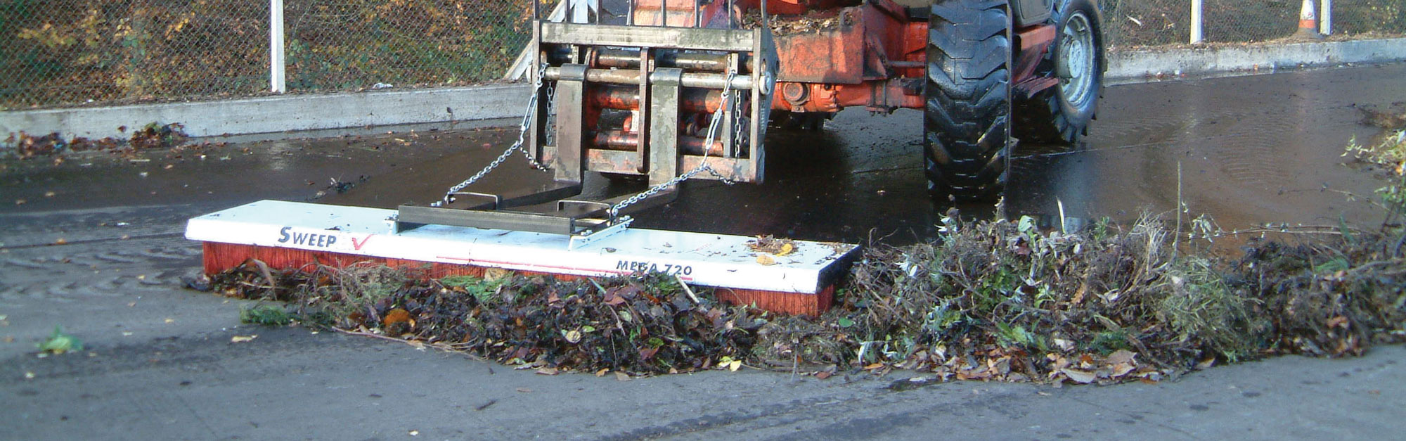 Sweepex MEGA broom in green waste